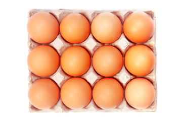 Eggs in a paper package on white background