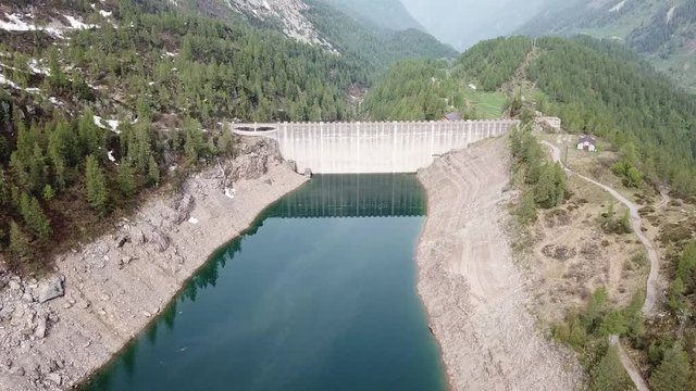 Drone aerial view of the Lake Fregabolgia an Alpine artificial lake. Italian Alps. Italy