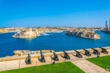 Saluting Battery facing Birgu town with Fort st. Angelo and Senglea in Valletta, Malta