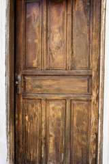 Fototapeta na wymiar The old door. Texture of an old board. Background.