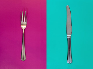 Fork on purple background. Knife on a bright turquoise background. concept. Seamless pattern