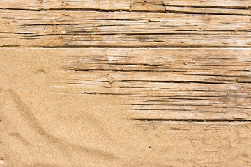 Naklejka na ściany i meble Sand on planked wood. Summer background with copy space. Top view