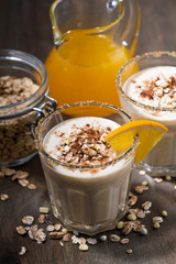 milkshake with oatmeal and orange, vertical