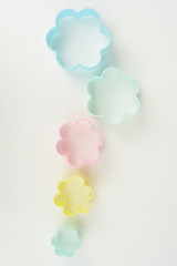 Close up of flower shaped of dessert plastic mold in multi color for background