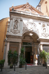 Genoa, old town: Maddalena Church's facade in the sun