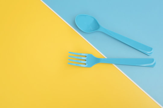 close up of plastic spoons for background