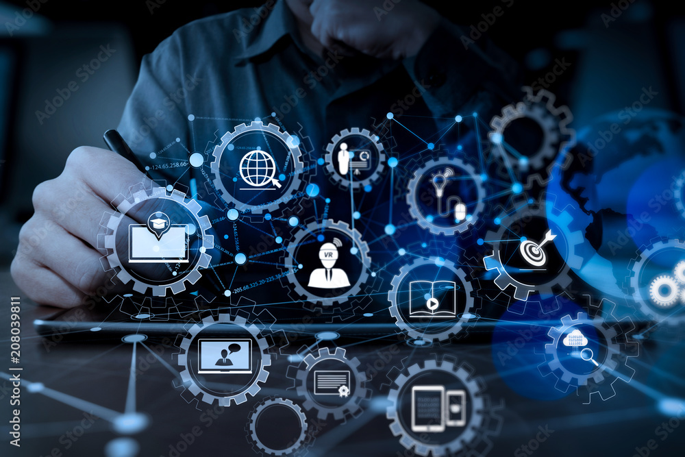 Aufkleber businessman hand working with modern technology digital tablet computer and digital layer effect