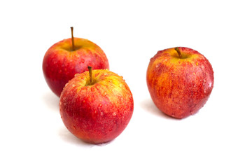 Three wet apples