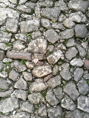 The texture of the stone pavement in the old town