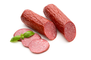 Salami smoked sausage, basil leaves on white background cutout.