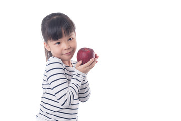 Fototapeta na wymiar portrait of a little girl eating apple