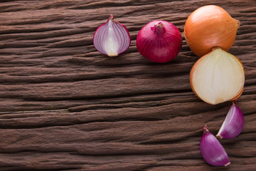 different onions on wood