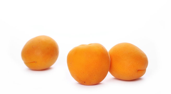 Fresh apricot fruits isolated on white background