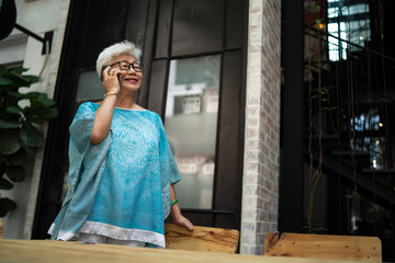 asian old lady using smartphone