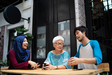 a married muslim couple with a chinese old lady