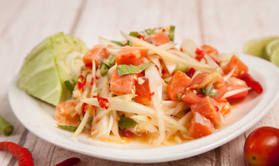 spicy papaya salad with fresh salmon - som tam thai food