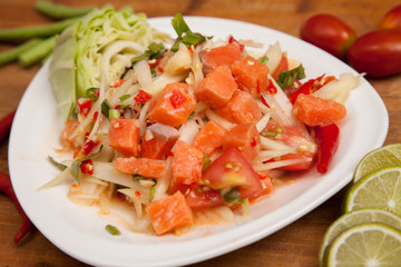 spicy papaya salad with fresh salmon - som tam thai food