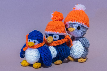 Homemade Three soft color toy penguin.