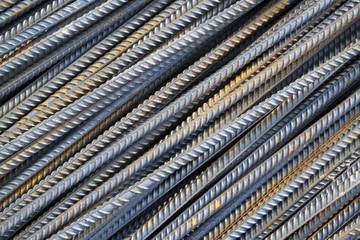 top view of the reinforcing steel bar stack close-up, rebar for concrete construction works piled on top of each other