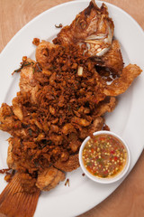 Fried fish and garlic thai style sauce - Thai food