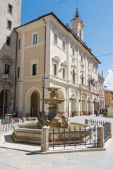 Tourist view of Rieti, in Lazio, Italy. The Town Hall and Fountain of the dolphins.
