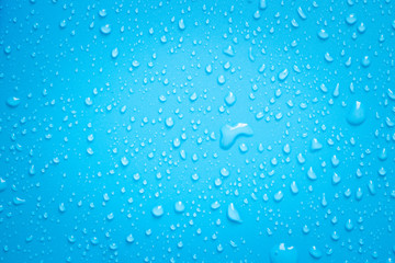 Water drops on blue background