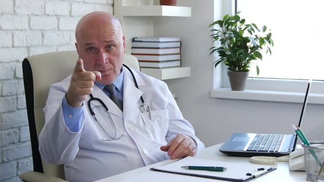 Confident Doctor Image Warning Serious Pointing With Finger
