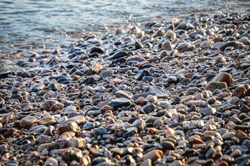 Shingle beach of the Red Sea Riviera in Taba small town, Egypt