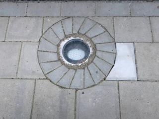 streetlamp constructd in the pavement