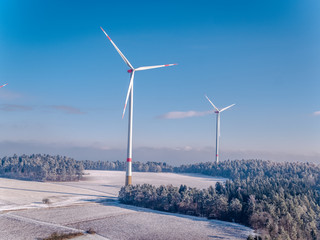 Fototapeta na wymiar Aerial Wind power wheels - Windkrafträder Green energy Landscape