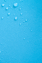 Water drops on blue background