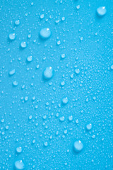 Water drops on blue background