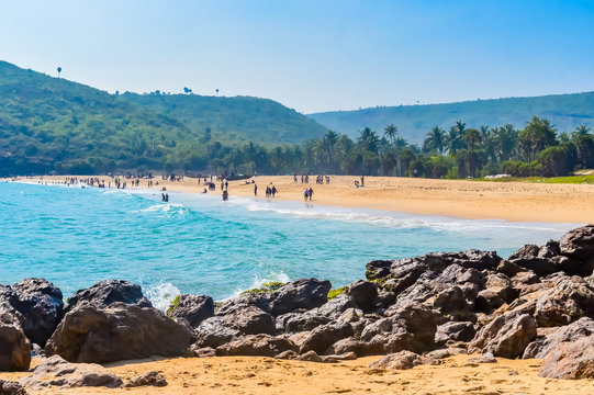 Photograph of Goa Sea Beach taken in Christmas Holiday during New Year celebration in landscape style Useful for background screen saver e-cards website banner usage Travel Vacation Concept