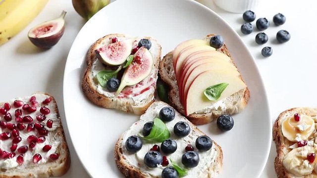 Healthy summer toasts for breakfast. Top view
