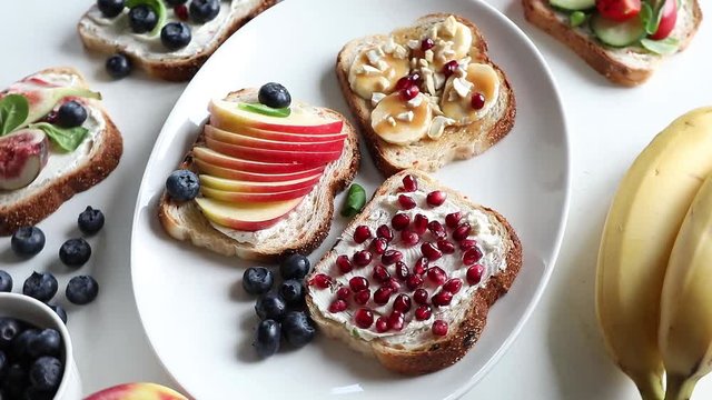 Healthy summer toasts for breakfast. Top view
