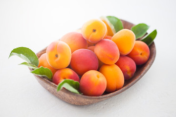 fresh apricots on white background
