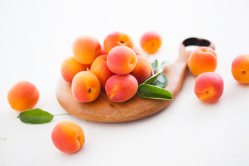 fresh apricots on white background