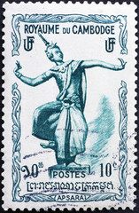 Statue of woman dancer on cambodian postage stamp