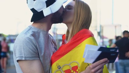 Smiling Spanish girl standing in street with national flag, patriotic feelings - Powered by Adobe
