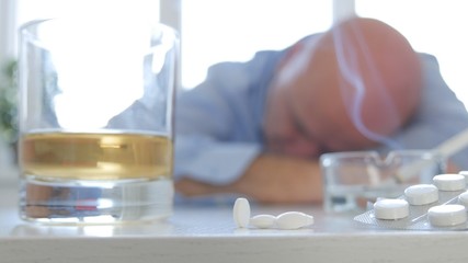 Tired Man Sleeping After Consume Drugs and Alcohol