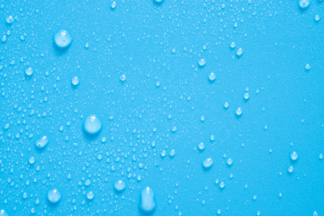 Water drops on blue background