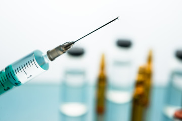 Close up Syringe needle medicine with liquid medicine drop