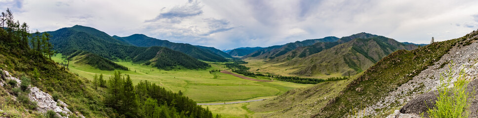 Fototapeta premium Panoramic view of Chike-Taman pass in the mountains of Altai Republic, Siberia, Russia