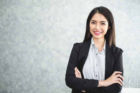 Portrait young beautiful asian business woman in formal suit in office