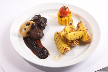 Tongue in sauce on plate