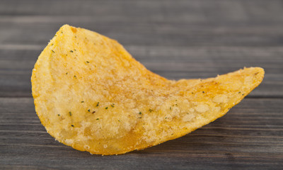 potato chips on a wooden background