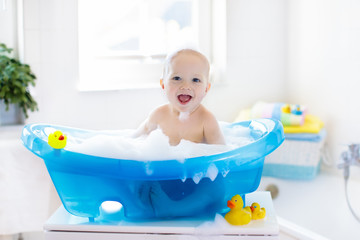 Little baby taking a bath