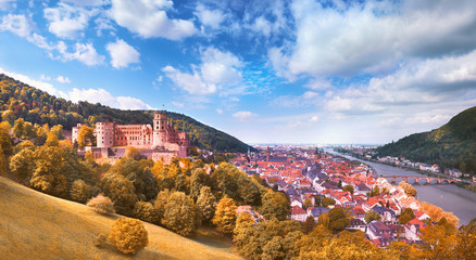 Ruins of Heidelberg castle and aerial view over Heidelberg town in Germany on a bright day in Fall