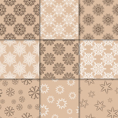 Brown beige floral ornaments. Collection of seamless patterns