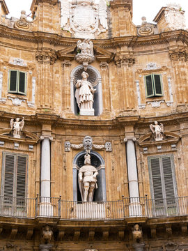 Palermo, Italy April, 2018: Statue of Philip IV and Saint Catherine at the Quattro Canti, Palermo Baroque facade at the sout-east corner in the historic center of Palermo